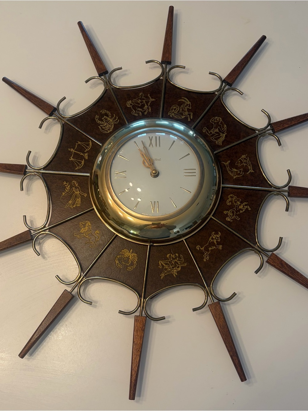 Zodiac Starburst Wall Clock in Brown and Gold
